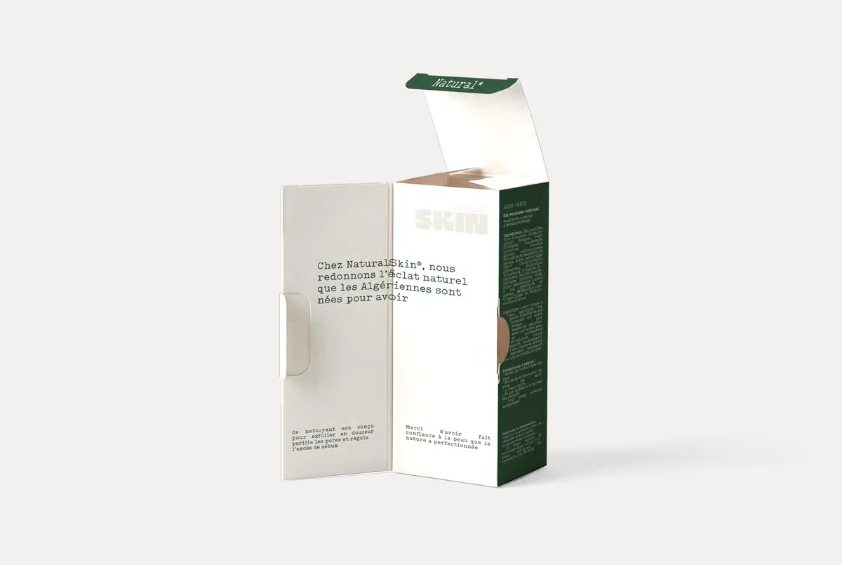 A Natural Skin carton opened to show the message printed on its inner face