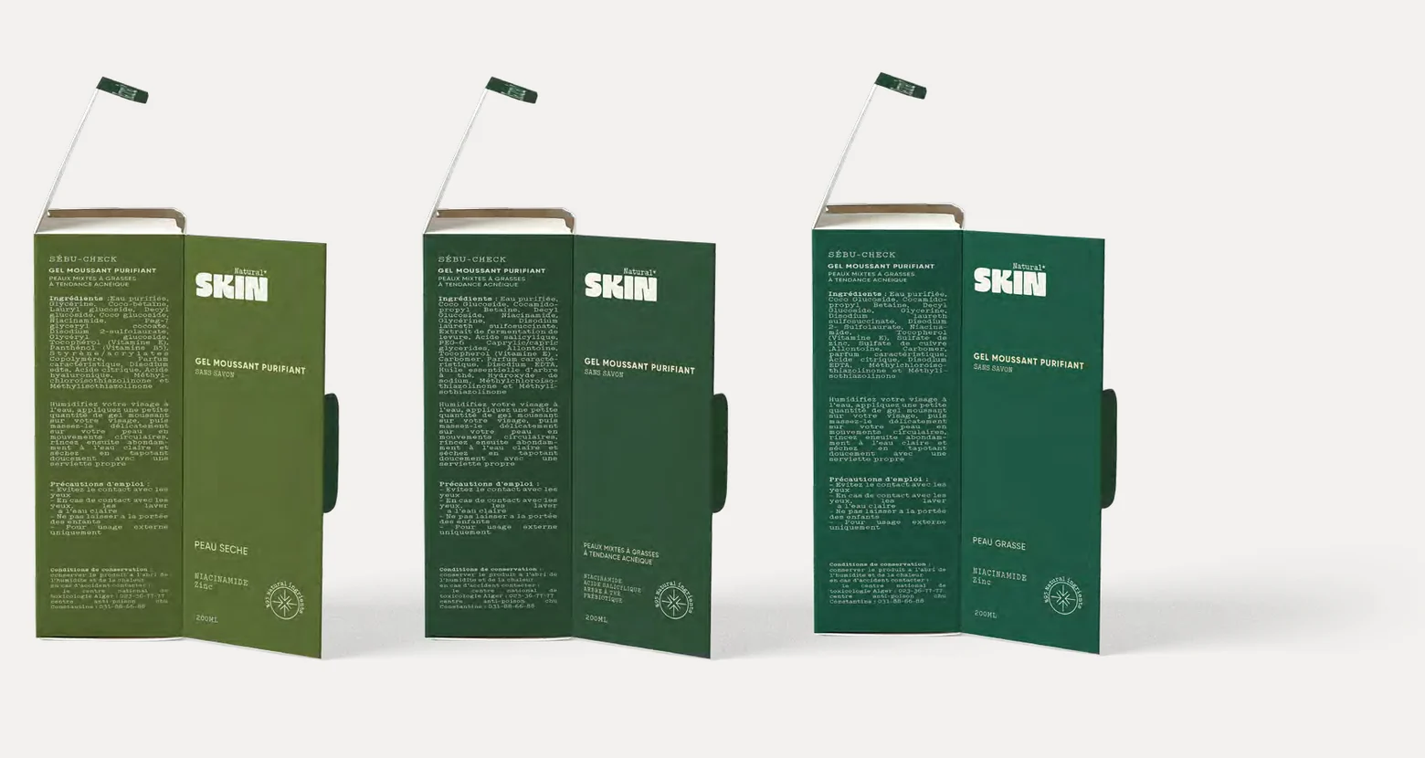 Three Natural Skin cartons in ascending depths of green, each labelled for a different skin type
